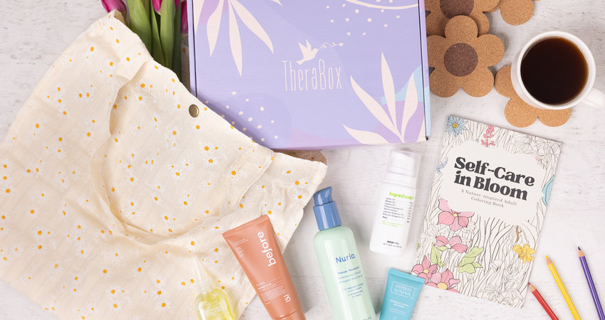 Sprout TheraBox with a flatlay of products 