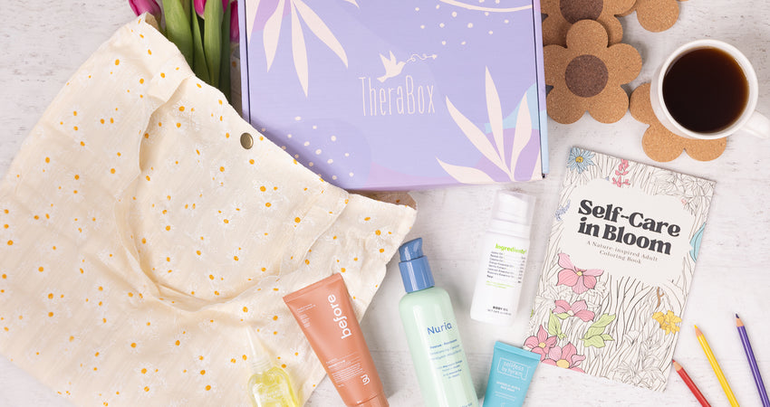Sprout TheraBox with a flatlay of products