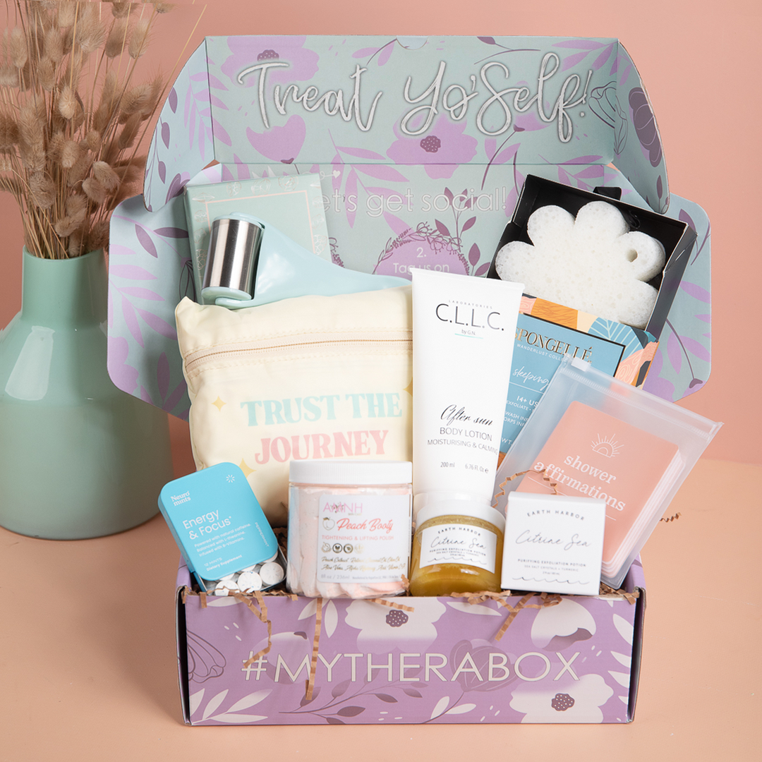 TheraBox Sunscape Box featuring CLLC by GN | After Sun Body Lotion (Moisturizing and Calming), EARTH HARBOR | Citrine Sea Purifying Exfoliation Face Potion, SPONGELLE | Wanderlust Collection - Body Wash Infused Buffers (scents vary), CHLOE EMERALD | Soothing Face and Eye Ice Roller, AMINNAH | Peach Booty Tightening & Lifting Polish, AYNIL CO. | Trust The Journey Travel Tote Bag, and JAX KELLY | Positivity Shower Affirmations | Neuro | energy and focus mints