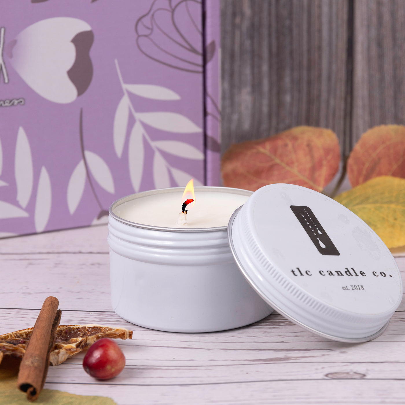 TLC’s Gatherings Candle igniting the comforting embrace of fall's bounty and heartfelt connections. With a heartwarming fusion of Red Currant, Teakwood, and Pomegranate entwined with the cozy essence of Nutmeg and Ginger
