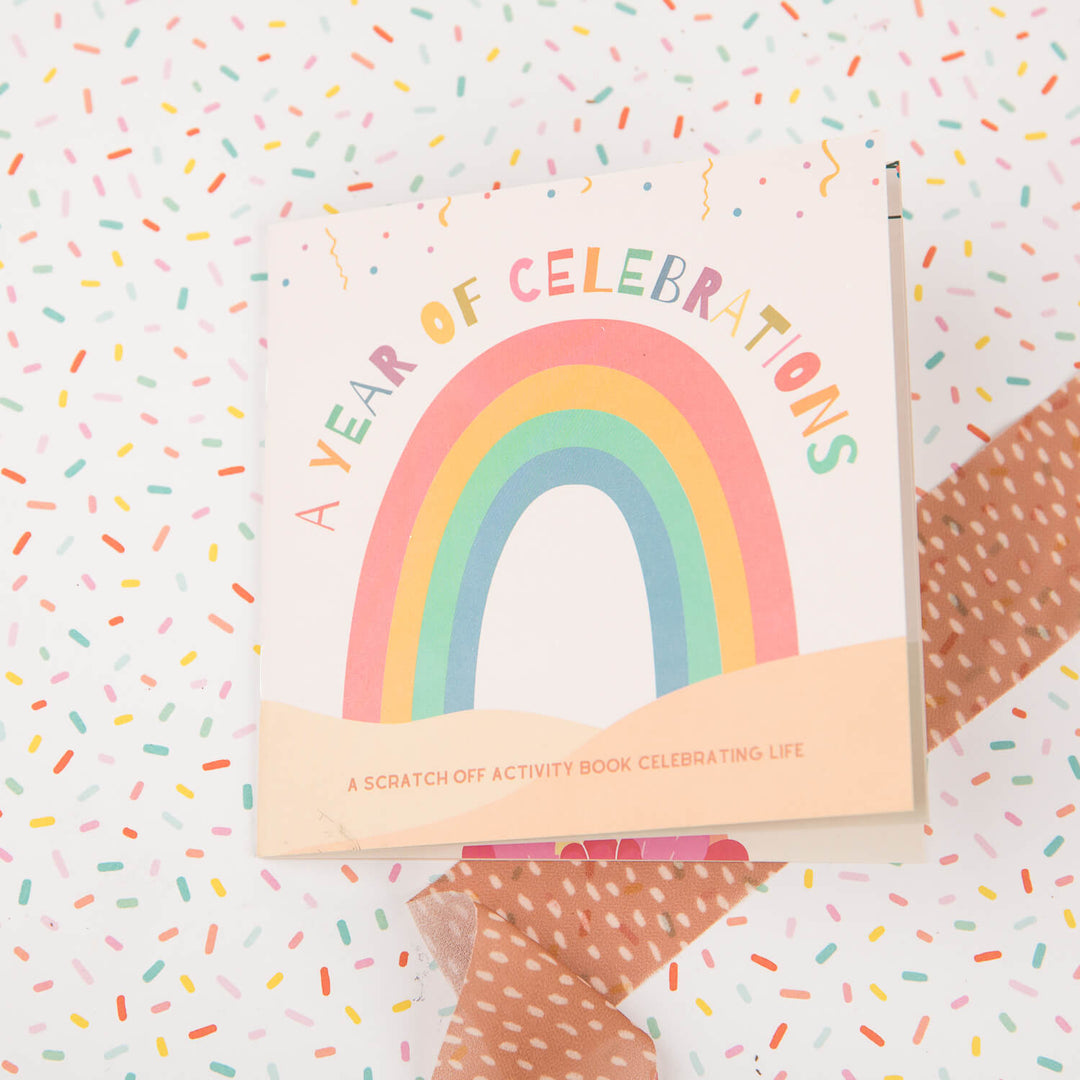 A Year of Celebrations. Scratch-off activity book