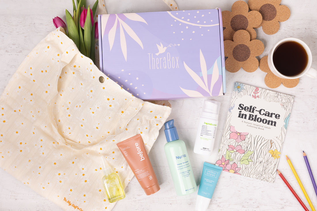 Sprout TheraBox with a flatlay of products 
