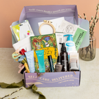 TheraBox Refresh Box featuring We Are Paradoxx | Detox Restorative Mask,  Skin Chemist | Youth Series Green Caviar Day Moisturizer,  Cucciosomatology | Cuccio Colour Nail Polish - True Nort,  Plant Therapy | Relax Roll On, The Aroma Shop | Organic Foot Care Mist, Flexitol | Sensitive Skin Wash, Common Care Hair | 8-Pack Spiral Hair Ties, Raleigh Briggs | Your Cozy Life, and Sustainable Towel Embroidery Kit