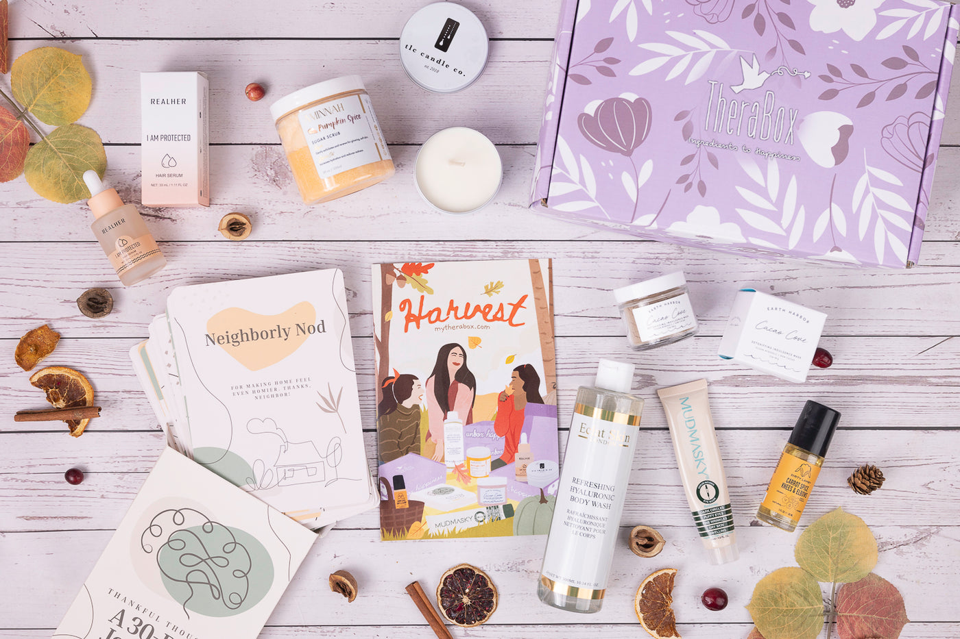 Therabox Harvest box featuring 8 self care items ranging from bath and body to skincare items