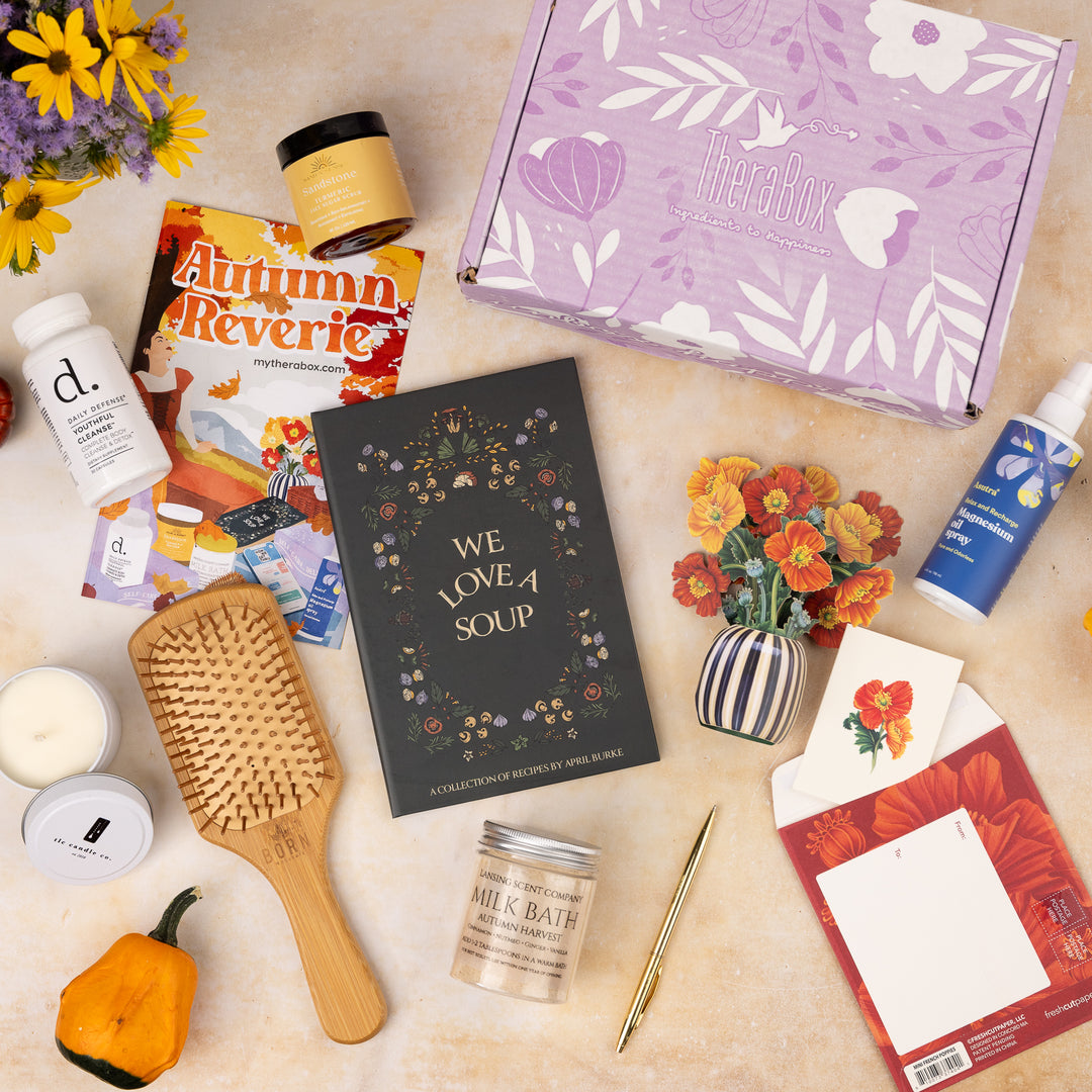 Inside Autumn Reverie box featuring 9 items Lansing Scent Company Autumn Harvest Milk Bath, Daily Defense Youthful Cleanse Complete Body Cleanse and Detox, TLC Candle Co. Harvest Soy Candle, Sand N' Sunset Turmeric Face Scrub, Born Naturals Signature BORN Paddle Brush, Asutra Relax and Recharge Magnesium Oil Spray,
Freshcut Papers  Mini French Poppies Card, April Burke  We Love a Soup Book How We Get Thru App 3-month subscription, Lansing Scent Company  Autumn Harvest Milk Bath